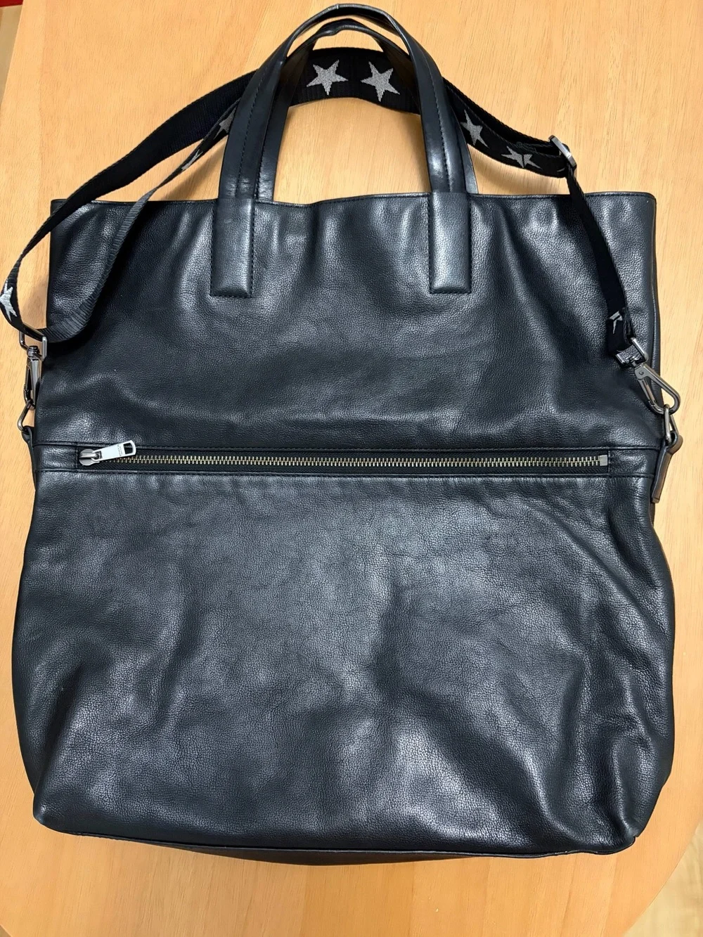 Coach Black Leather Messenger Bag with Detachable Star Accent Strap